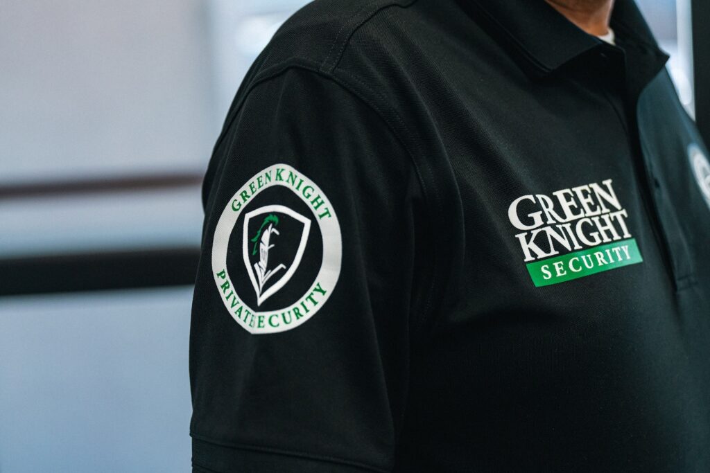 Green Knight Security guard uniform showing armed vs unarmed security guards branding in California
